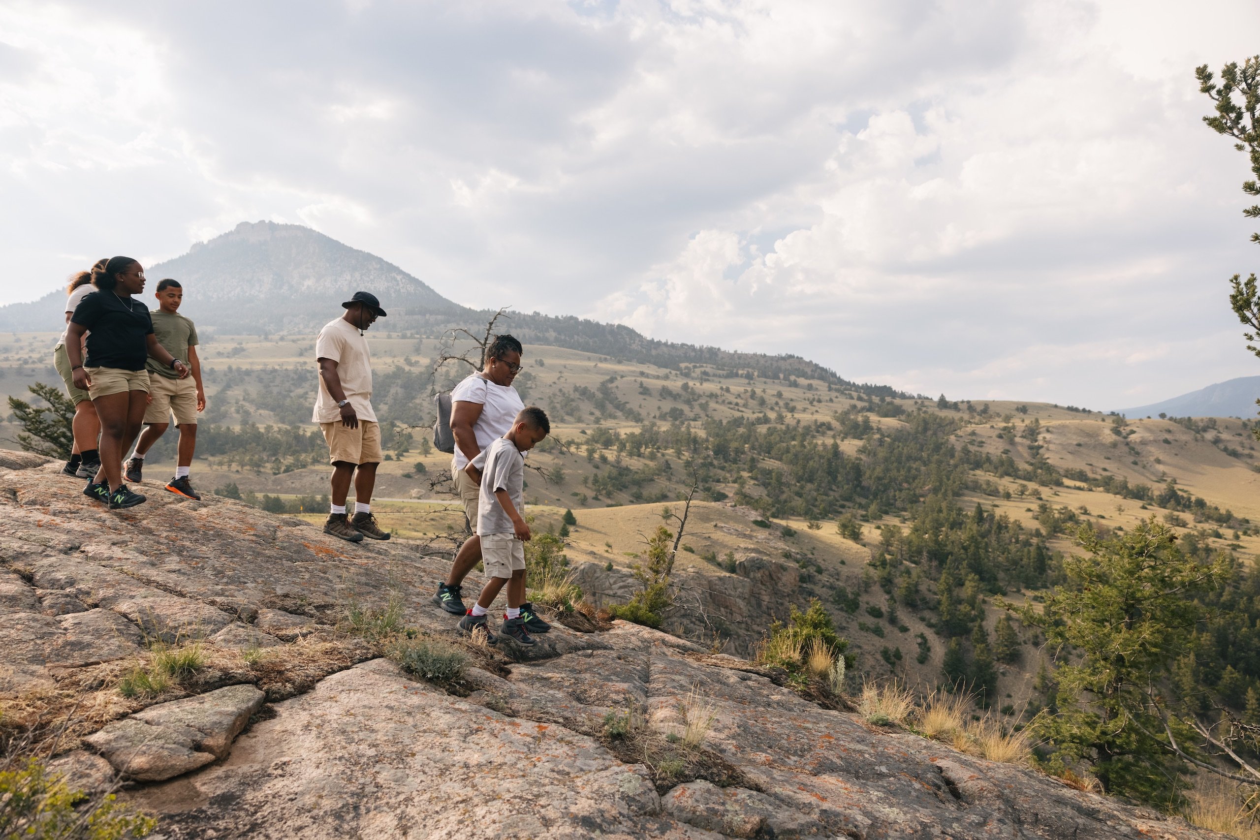 a family hiking in yellowstone