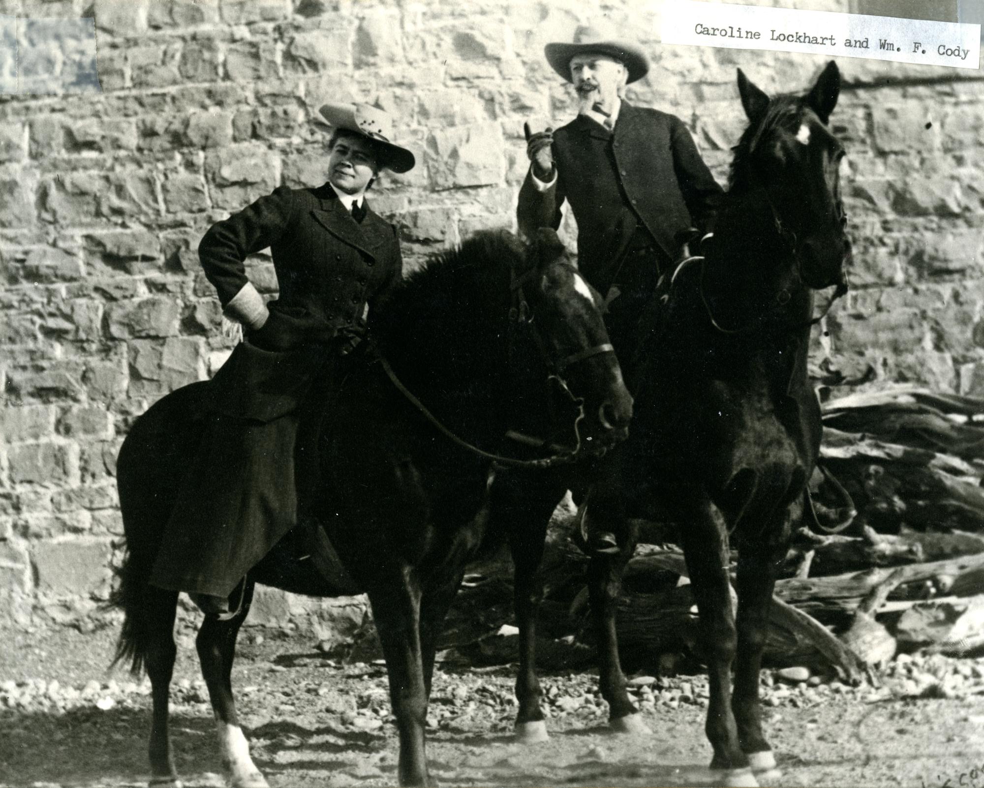 Buffalo Bill and Caroline Lockhart sitting on their horses