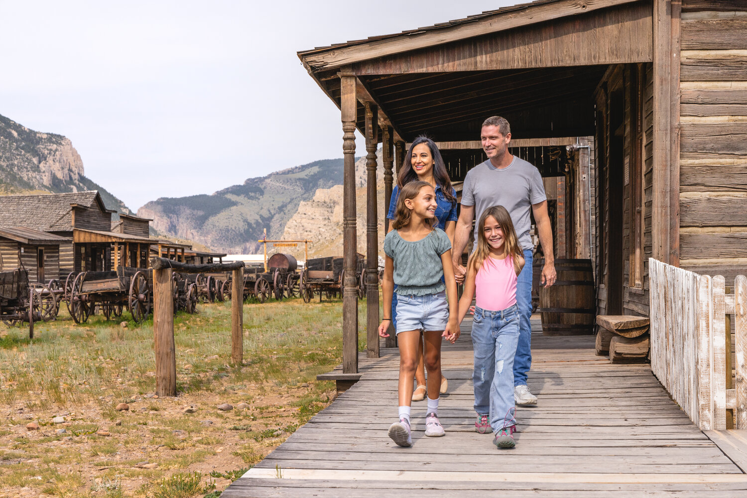 A family explores Old Trail Town.