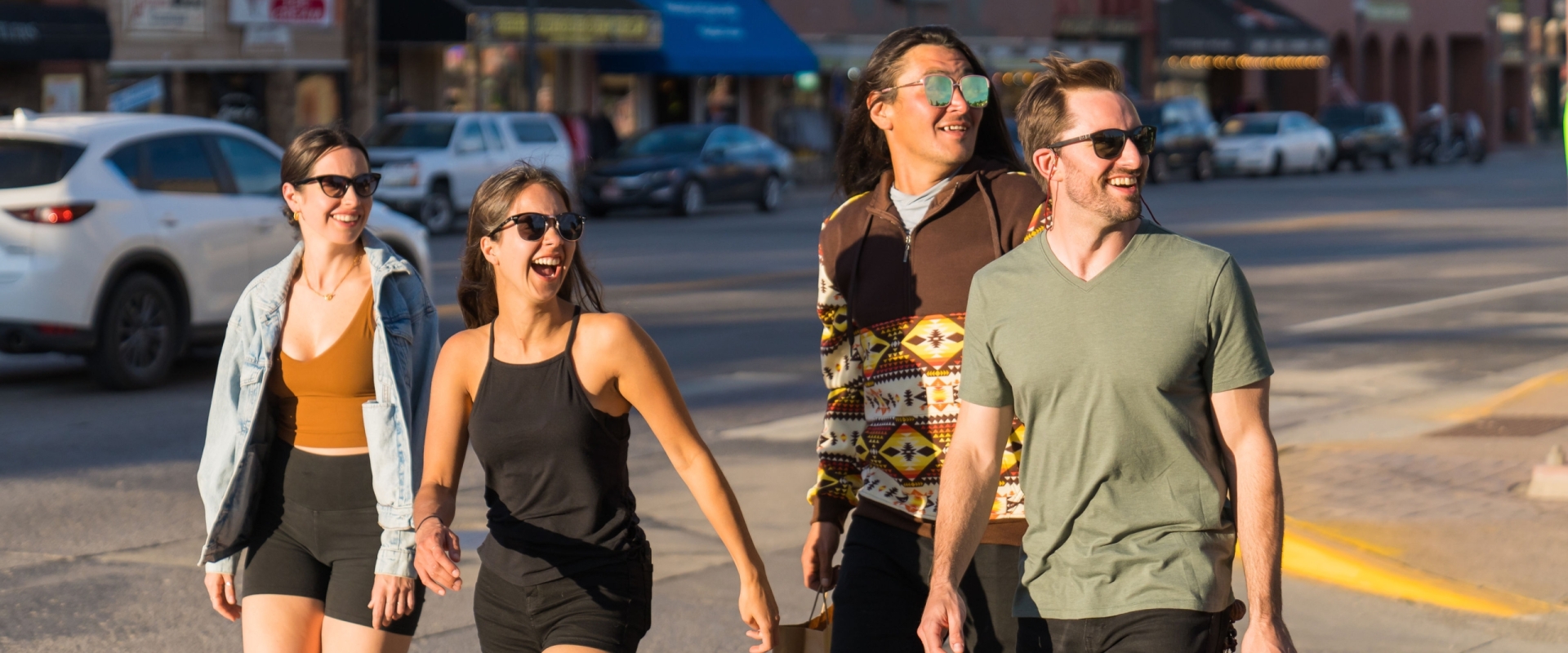 Three people walking down the street