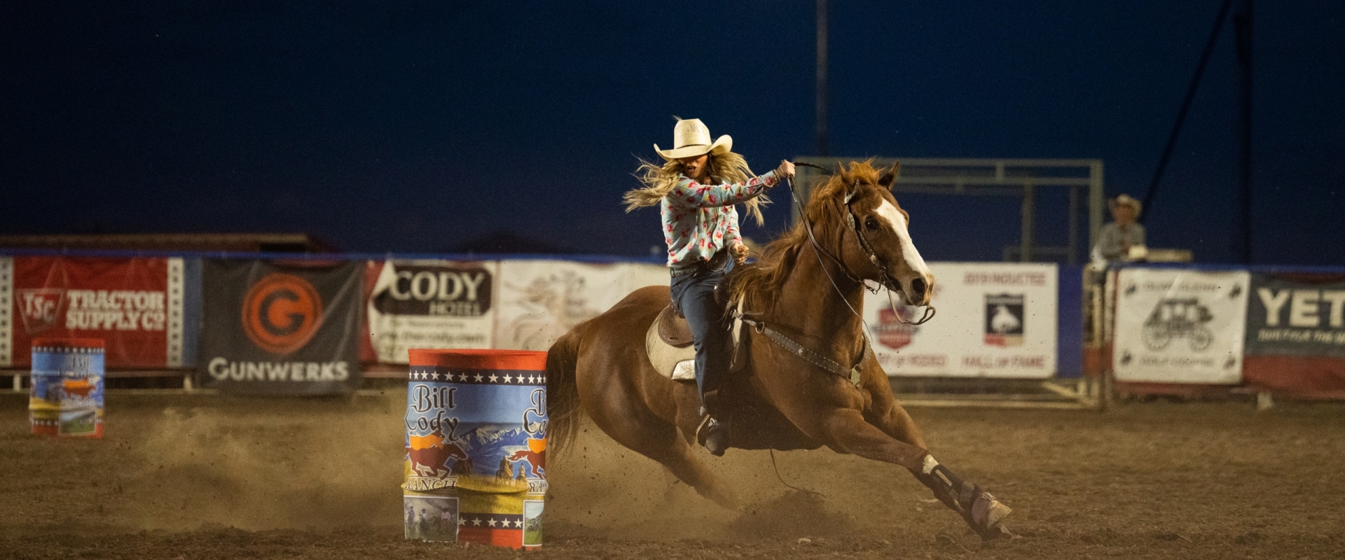 Person riding a horse at a rodeo