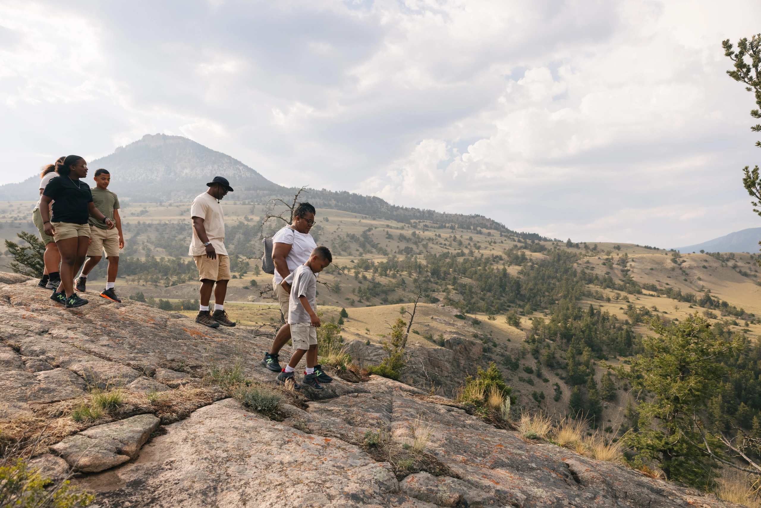 A family walking in the mountains