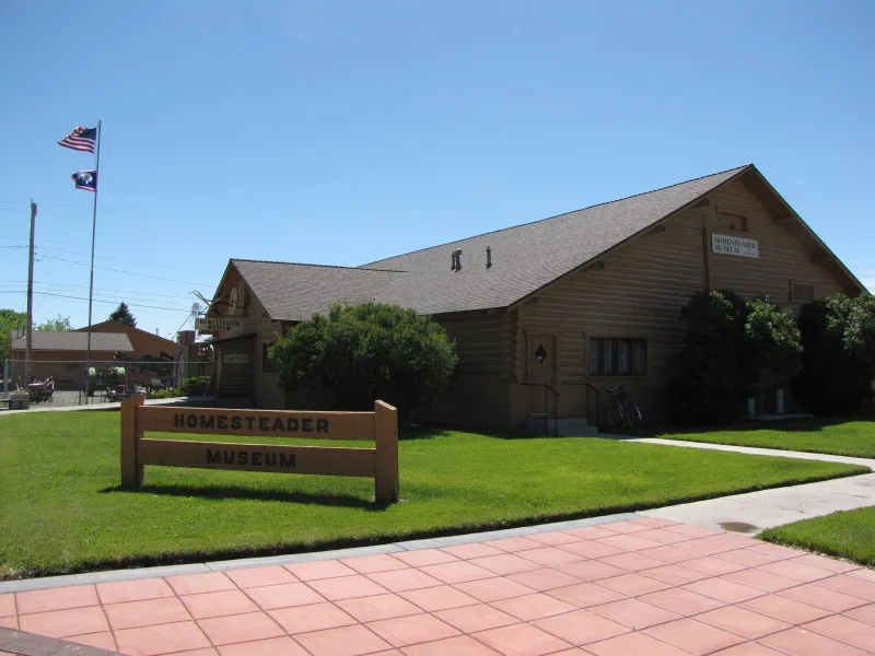 A spacious building with a noticeable sign displayed, indicating its name or function clearly.