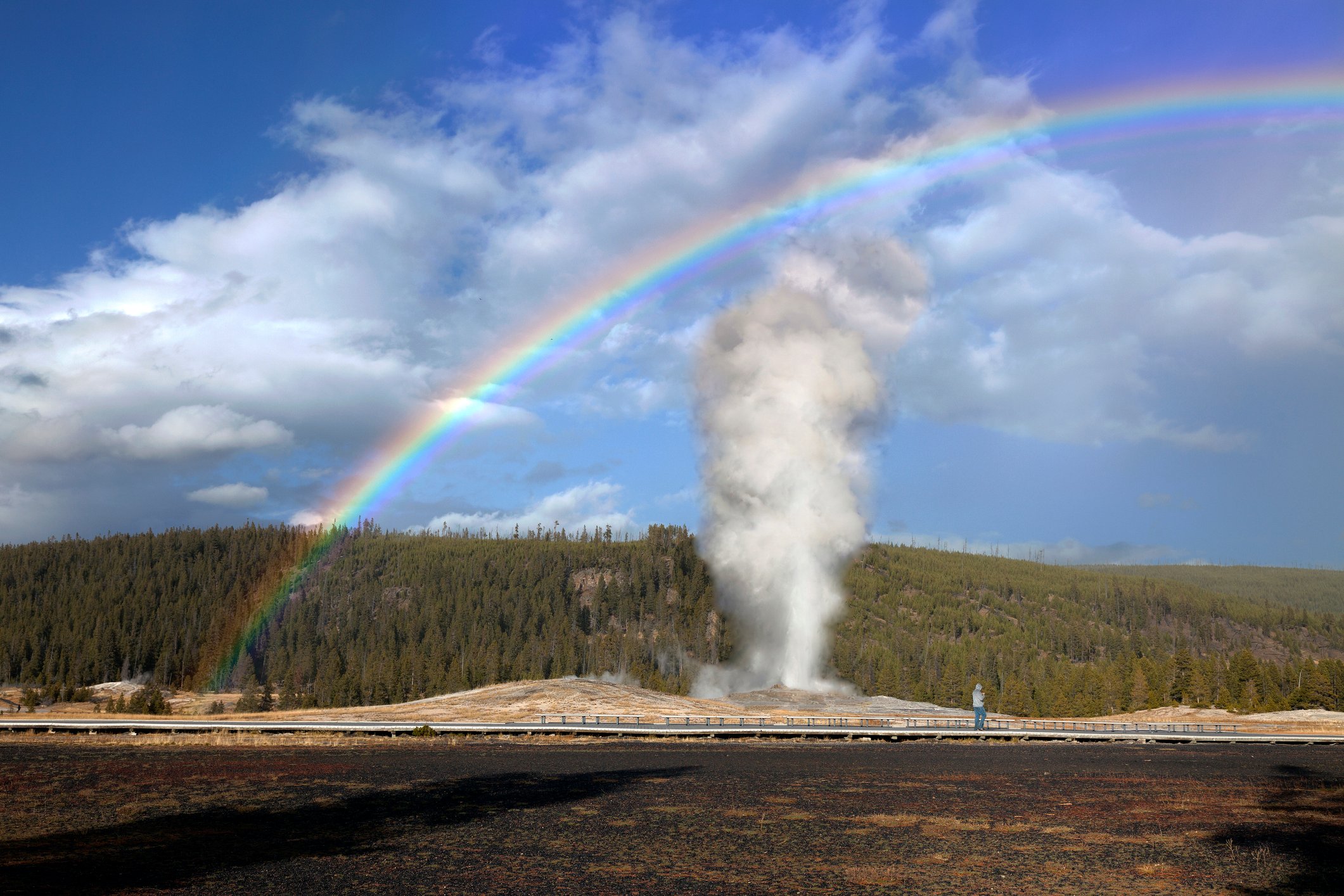 Rainbow over Old Faithful in Yellowstone National Park