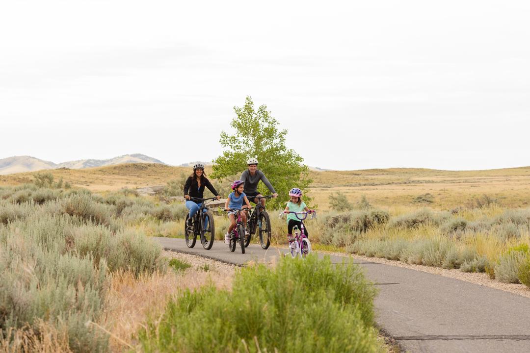 A family riding bikes in Cody Yellowstone