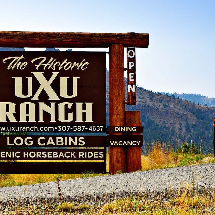 UXU ranch road sign