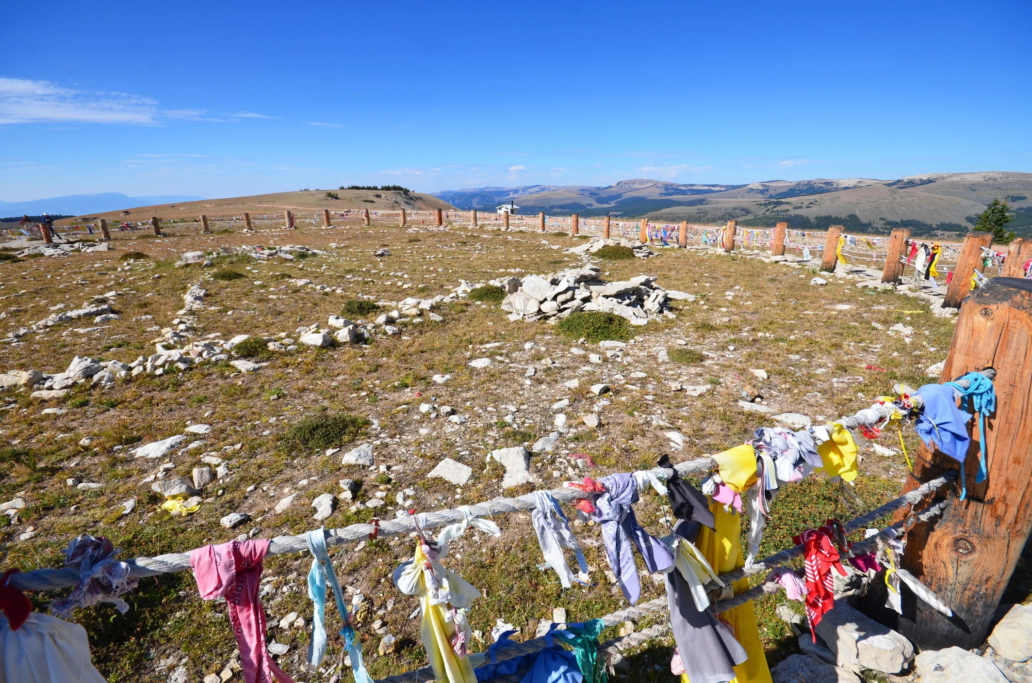 Bighorn Mountain Loop with a fence and a bunch of clothes tied to the fence.