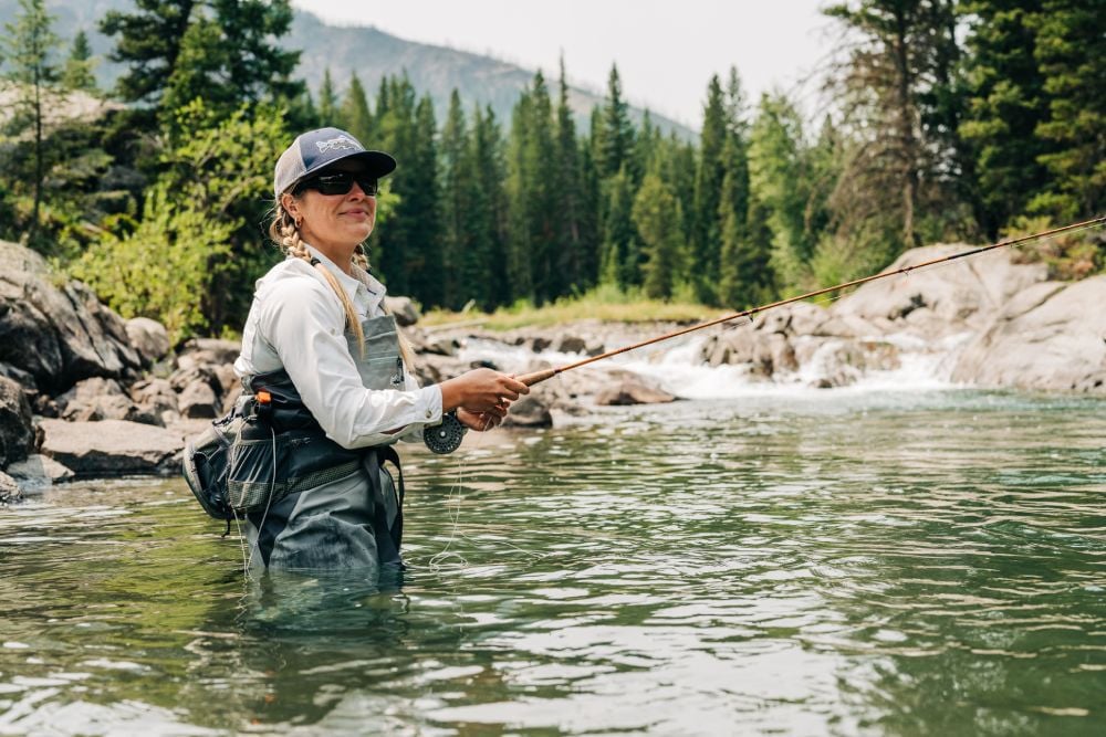 A woman fishes near Beartooth in Cody Yellowstone