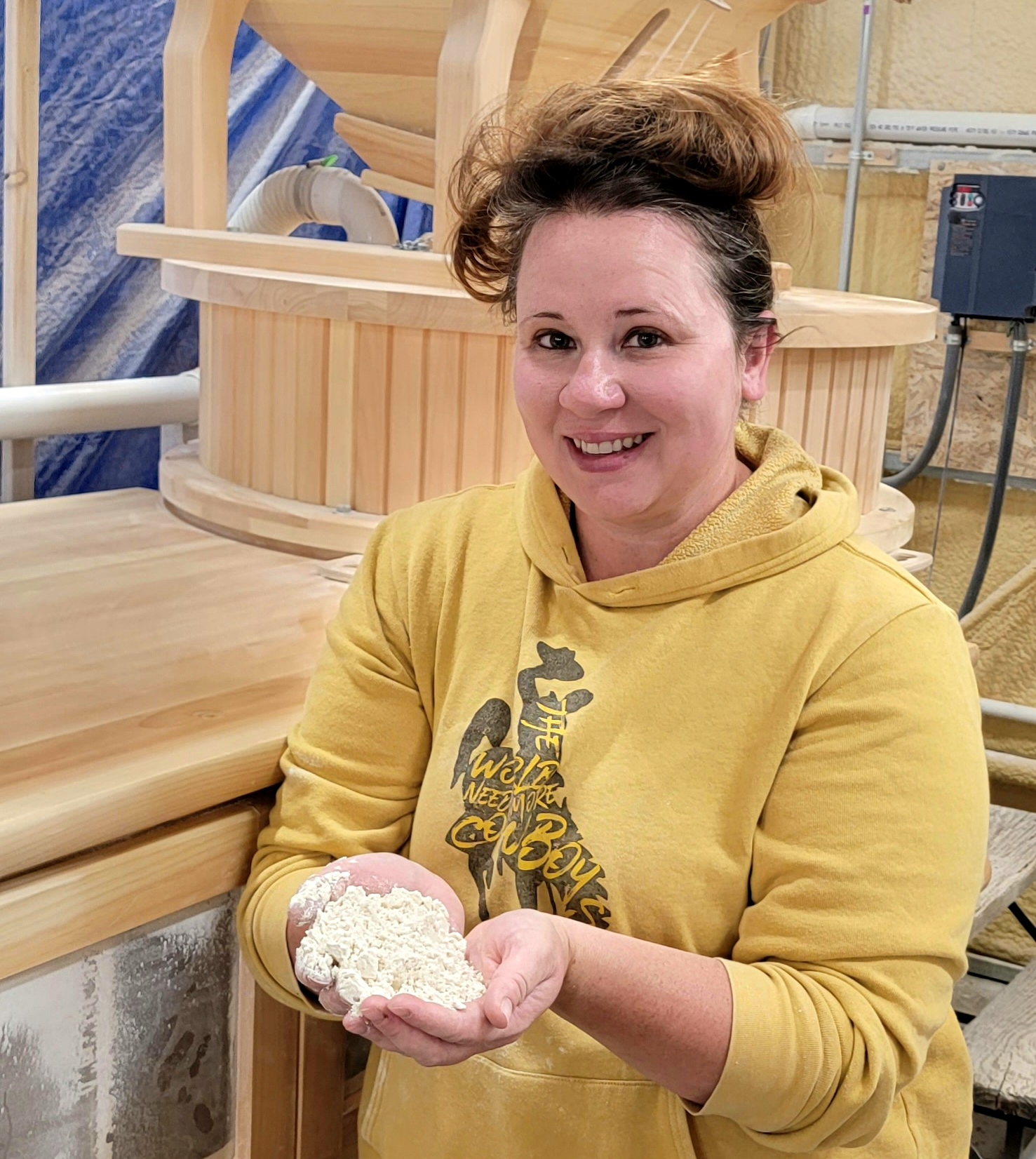 Sara Wood holding some grains.