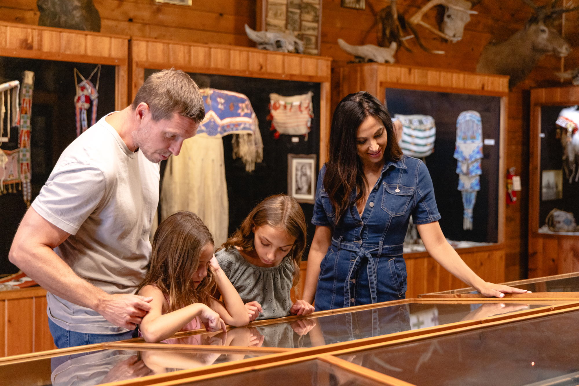 A family exploring a museum in Cody Yellowstone