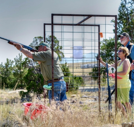 Man taking a shot at target shooting